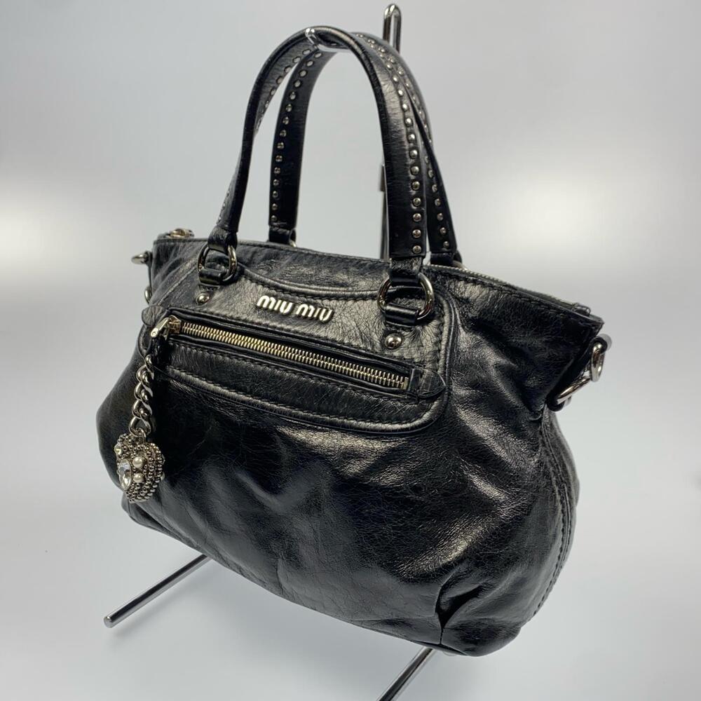 Miu Miu heart charm leather bag bags